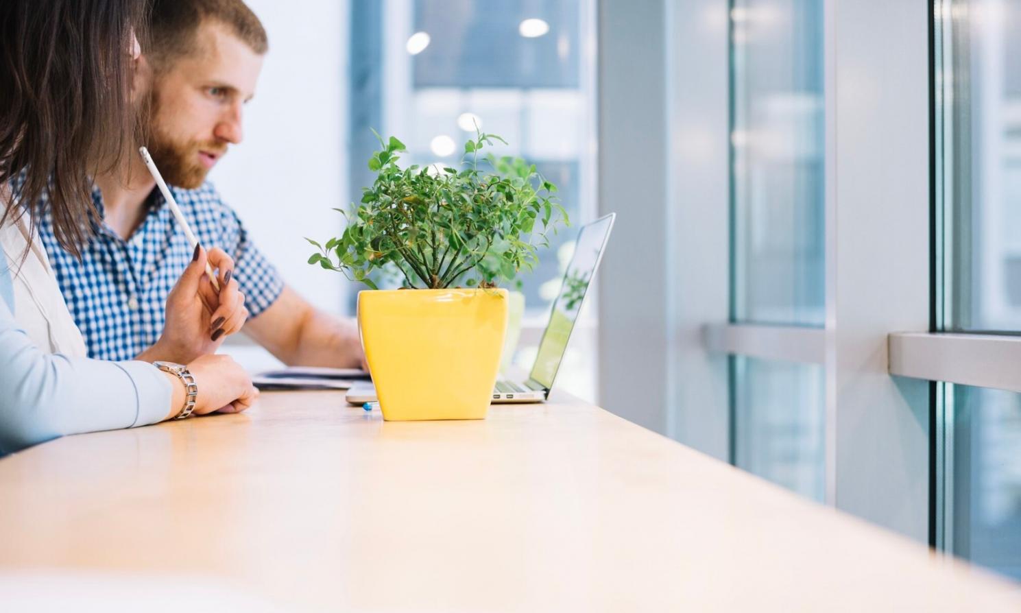 Trading analysis workspace with multiple screens showing market trends and technical indicators
